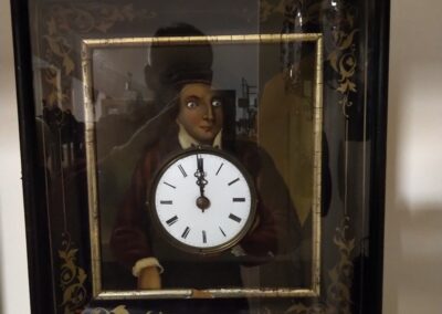 Szemét forgató órafigura